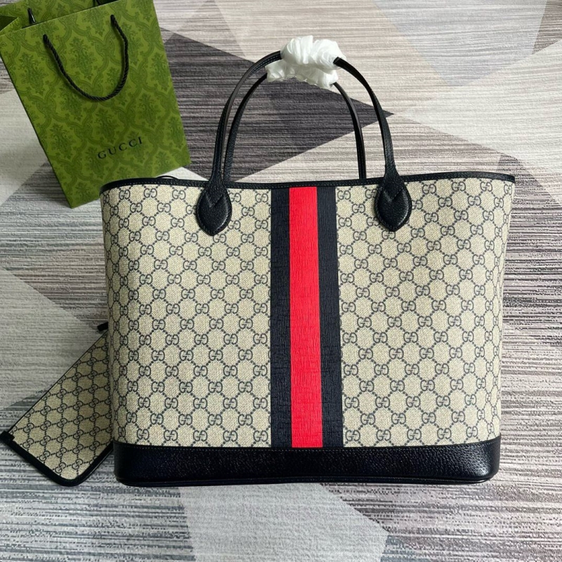 G*u*i shopping bags